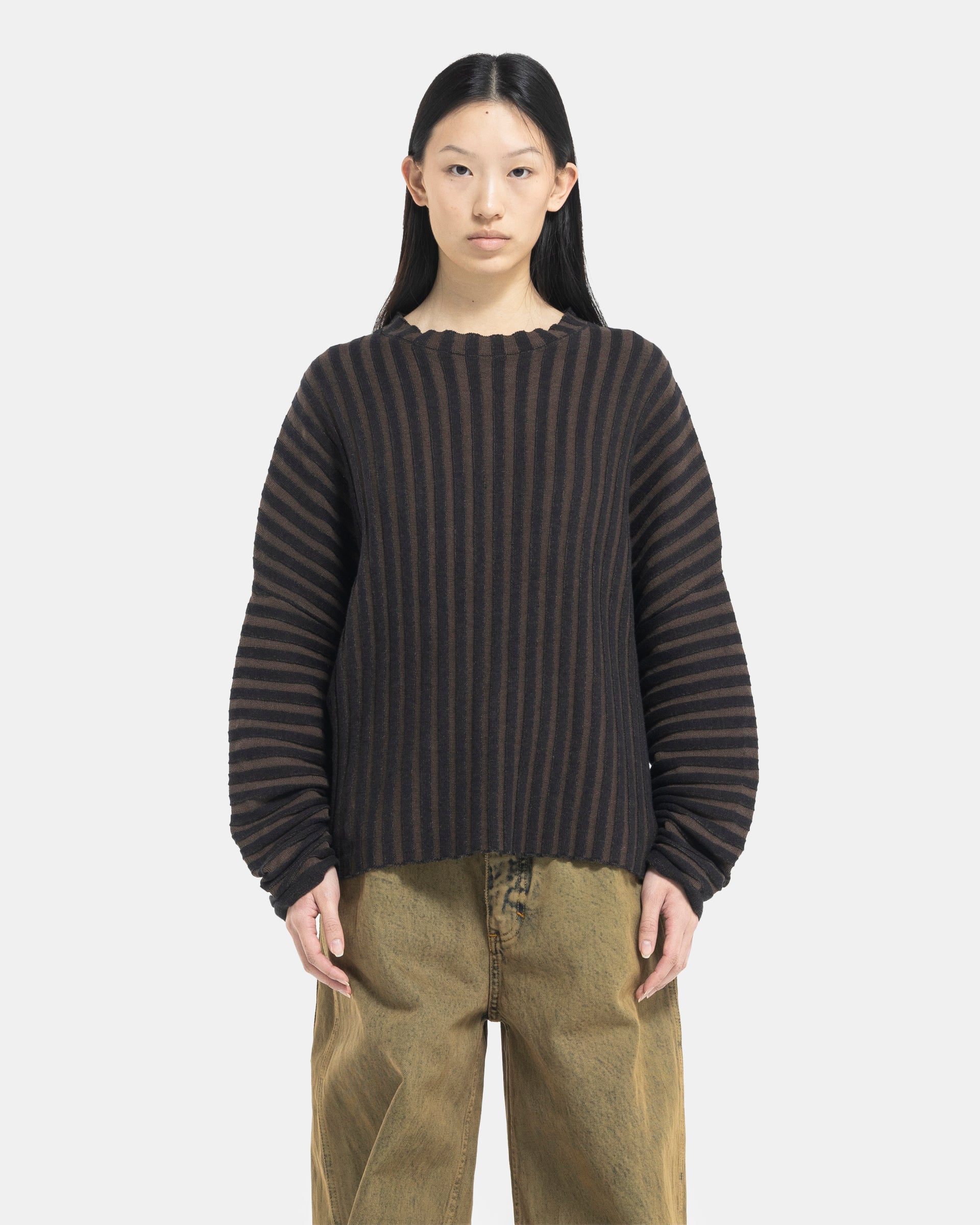 Model wearing Eckhaus Latta Designer Wool Brown Sweater