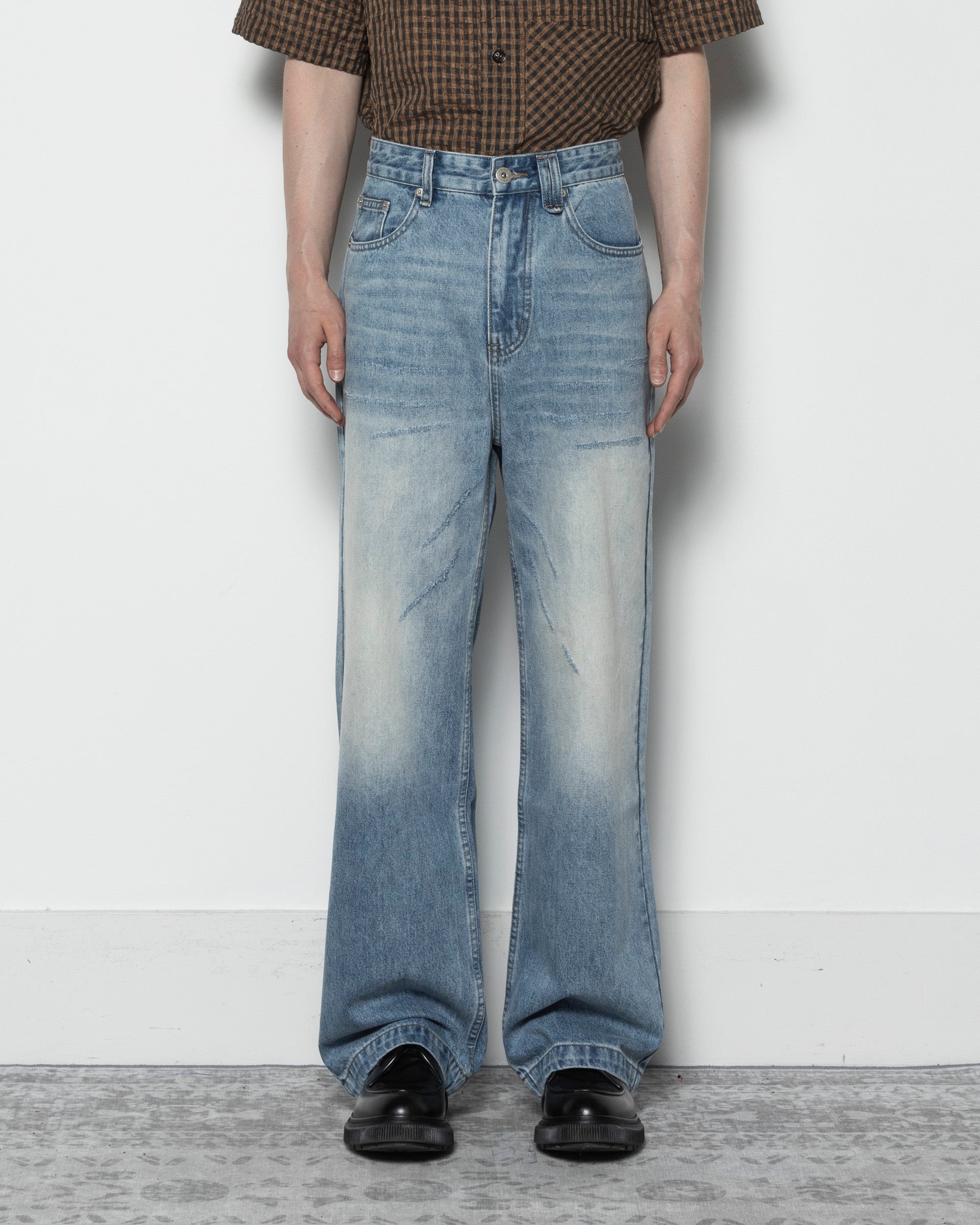 Scar Cut Whisker Jeans in Blue