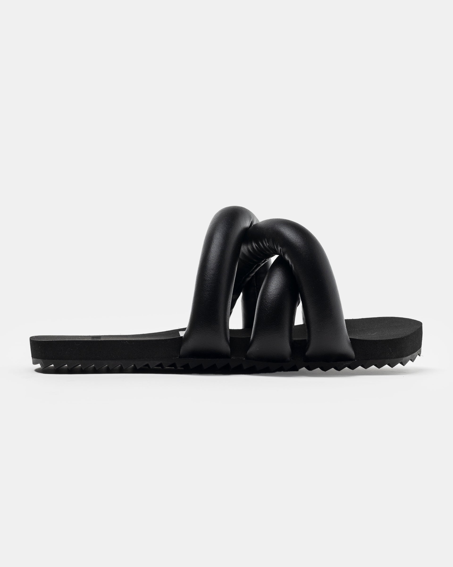 Yume Yume Black Tyre Slide on white background