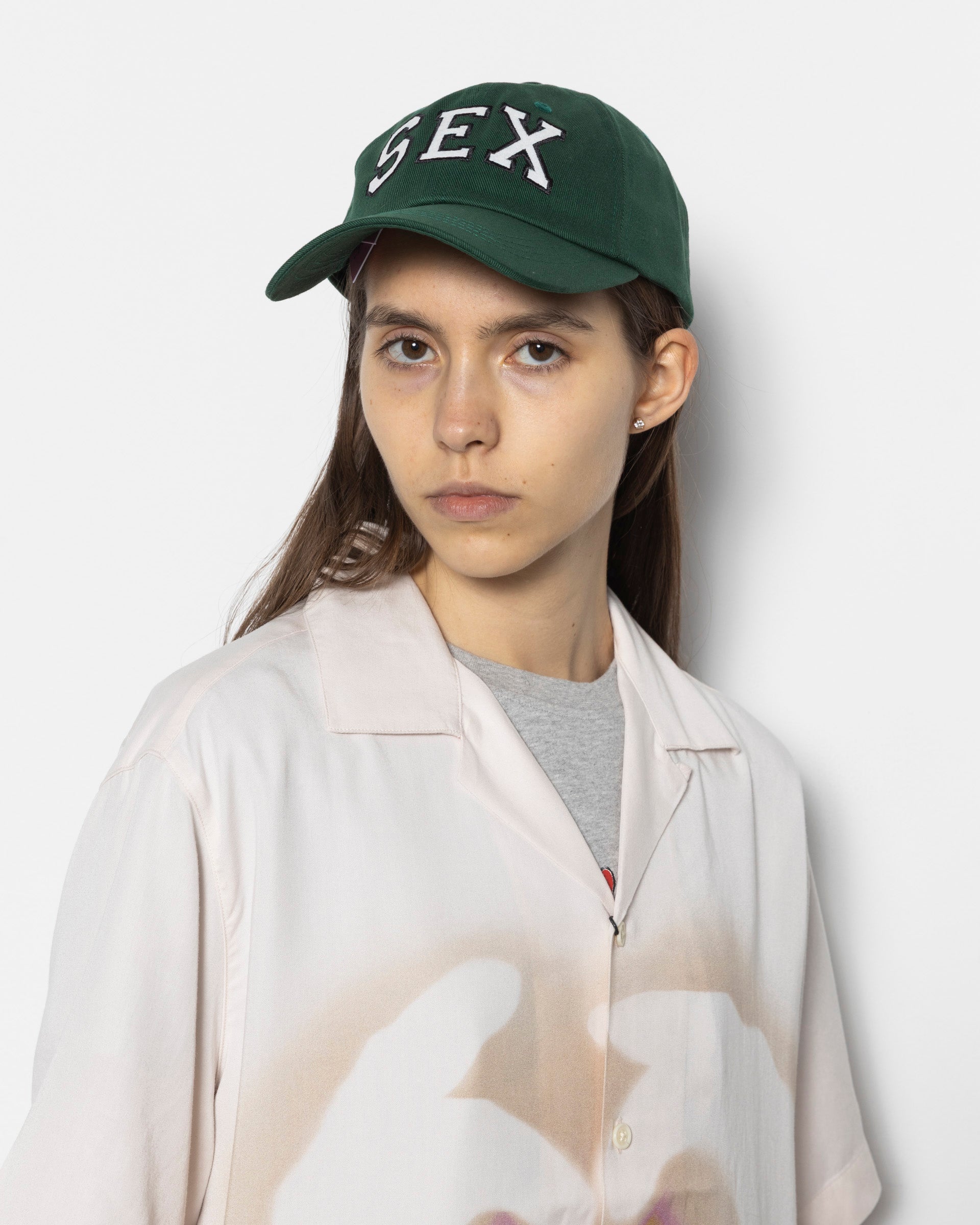 Sex Wins Cap in Green