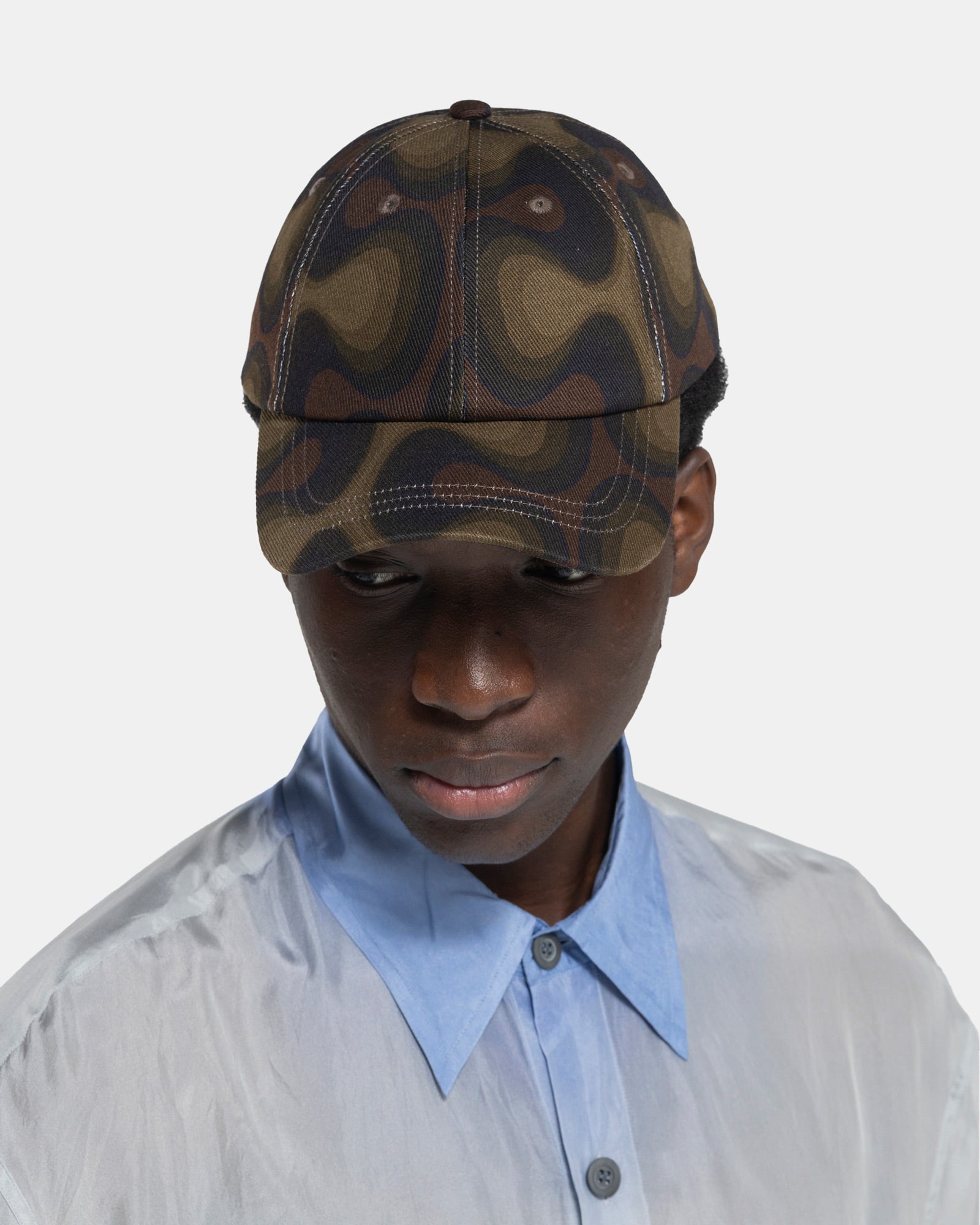 Model Wearing Giles Cap in Khakifrom Dries Van Noten