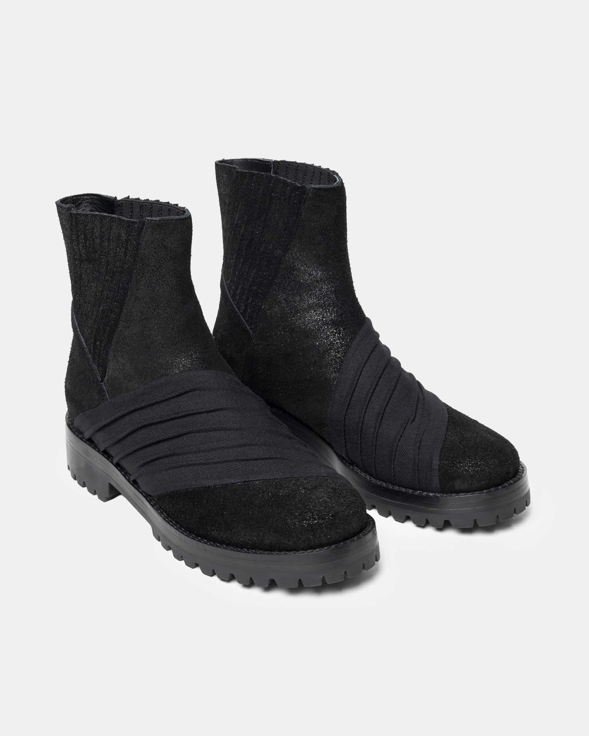 Sinner Ankle Boots in Black
