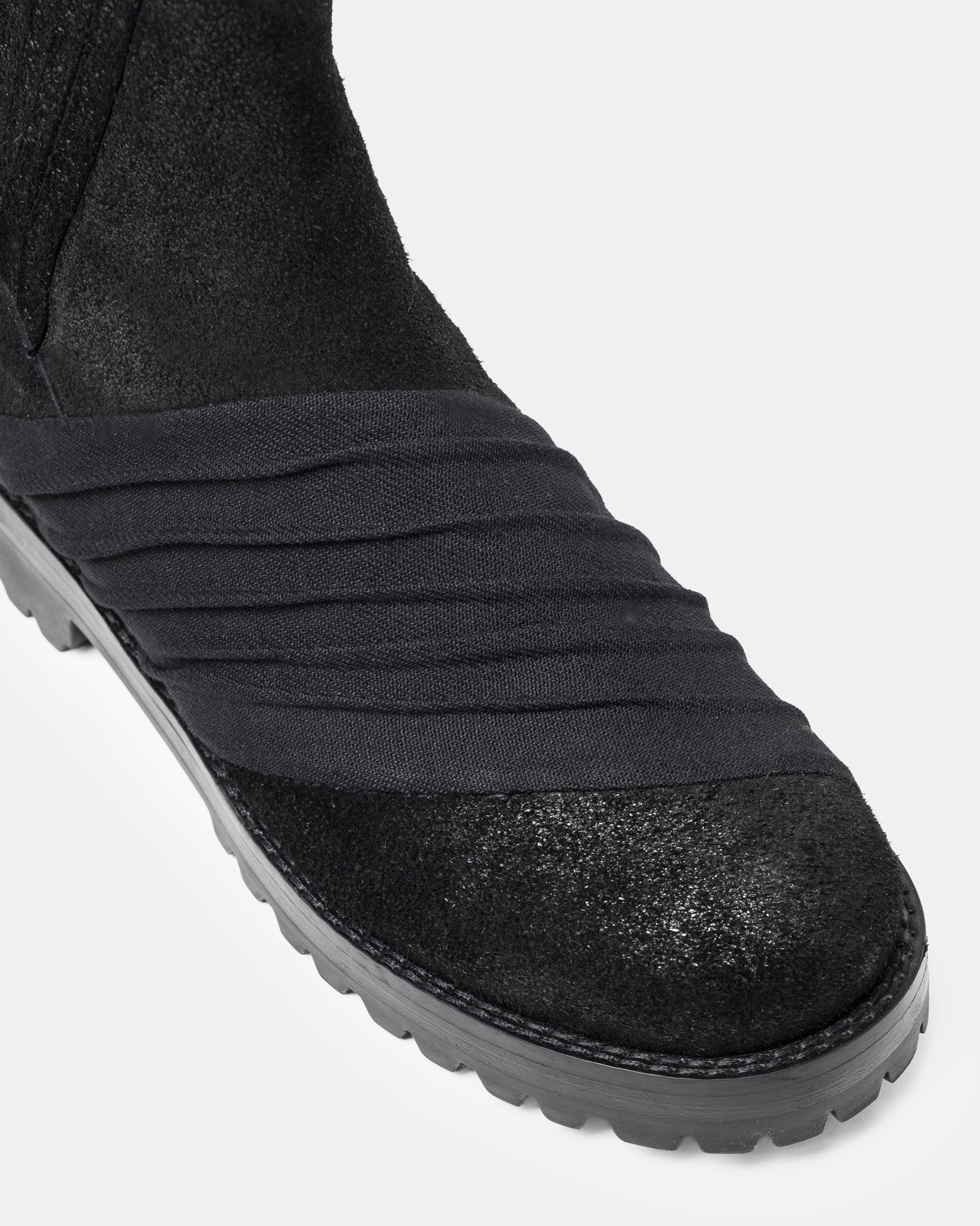 Sinner Ankle Boots in Black