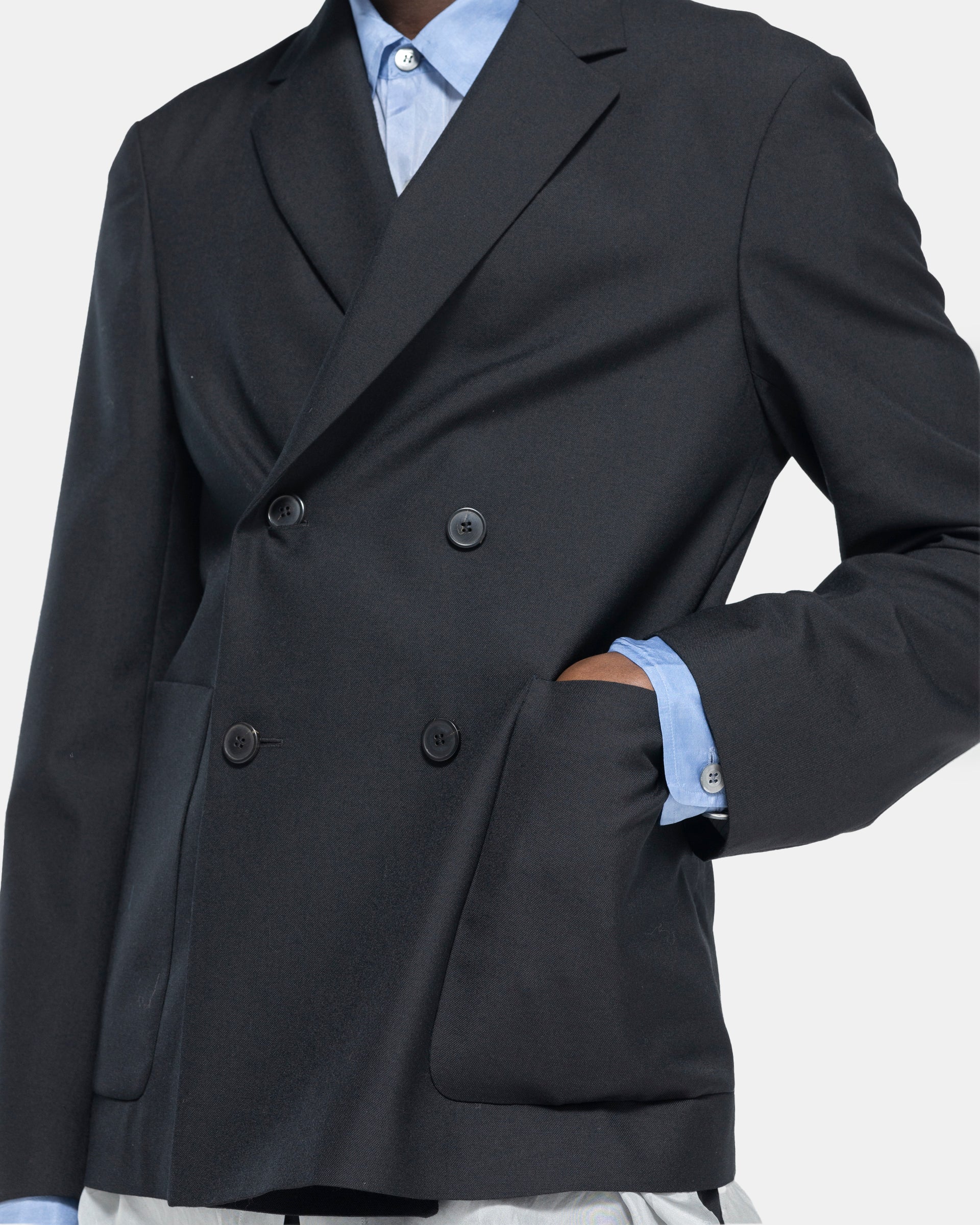 close up Model wearing Dries Van Noten Barleys Jacket in Black on white background
