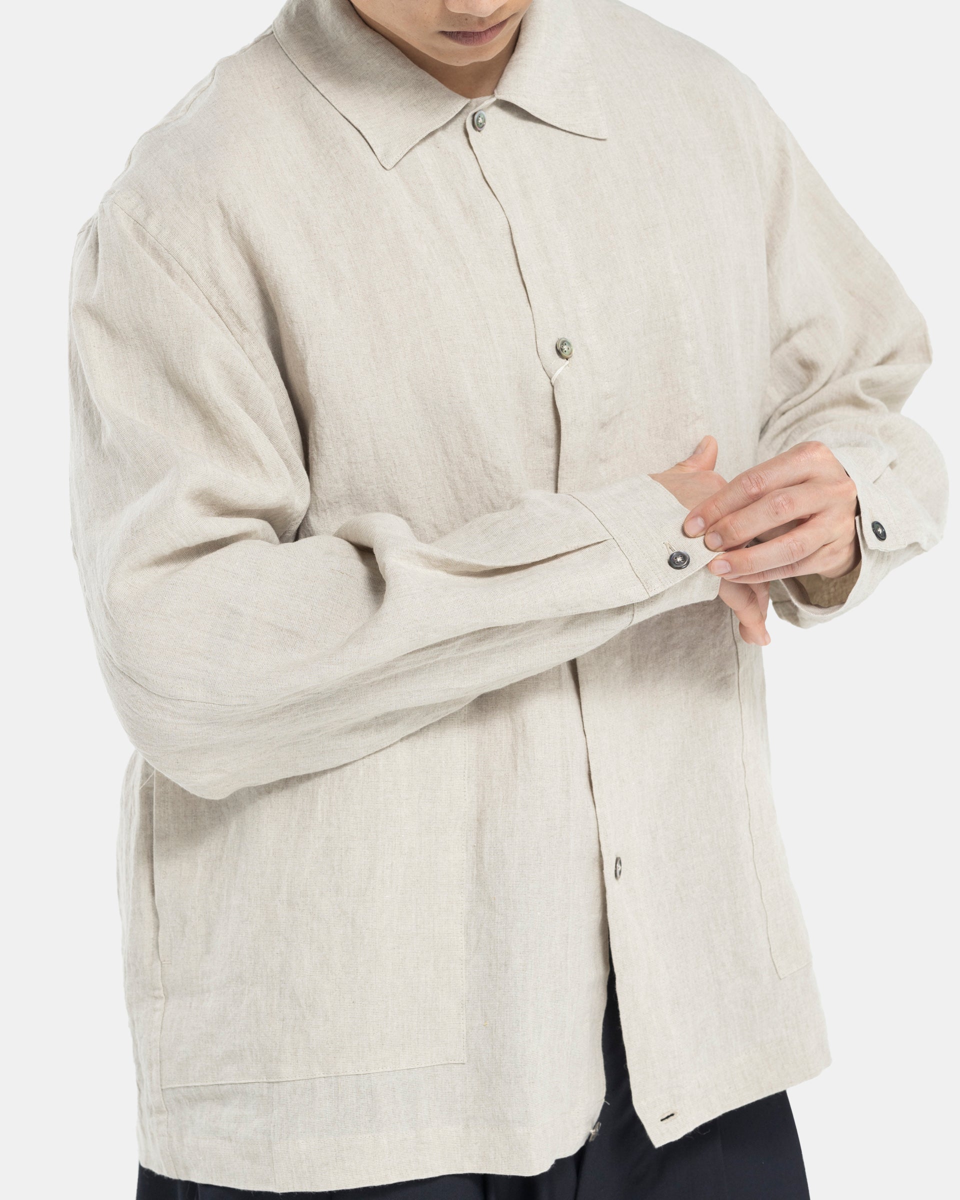 Male model wearing Beige Still By Hand Jacket on white background