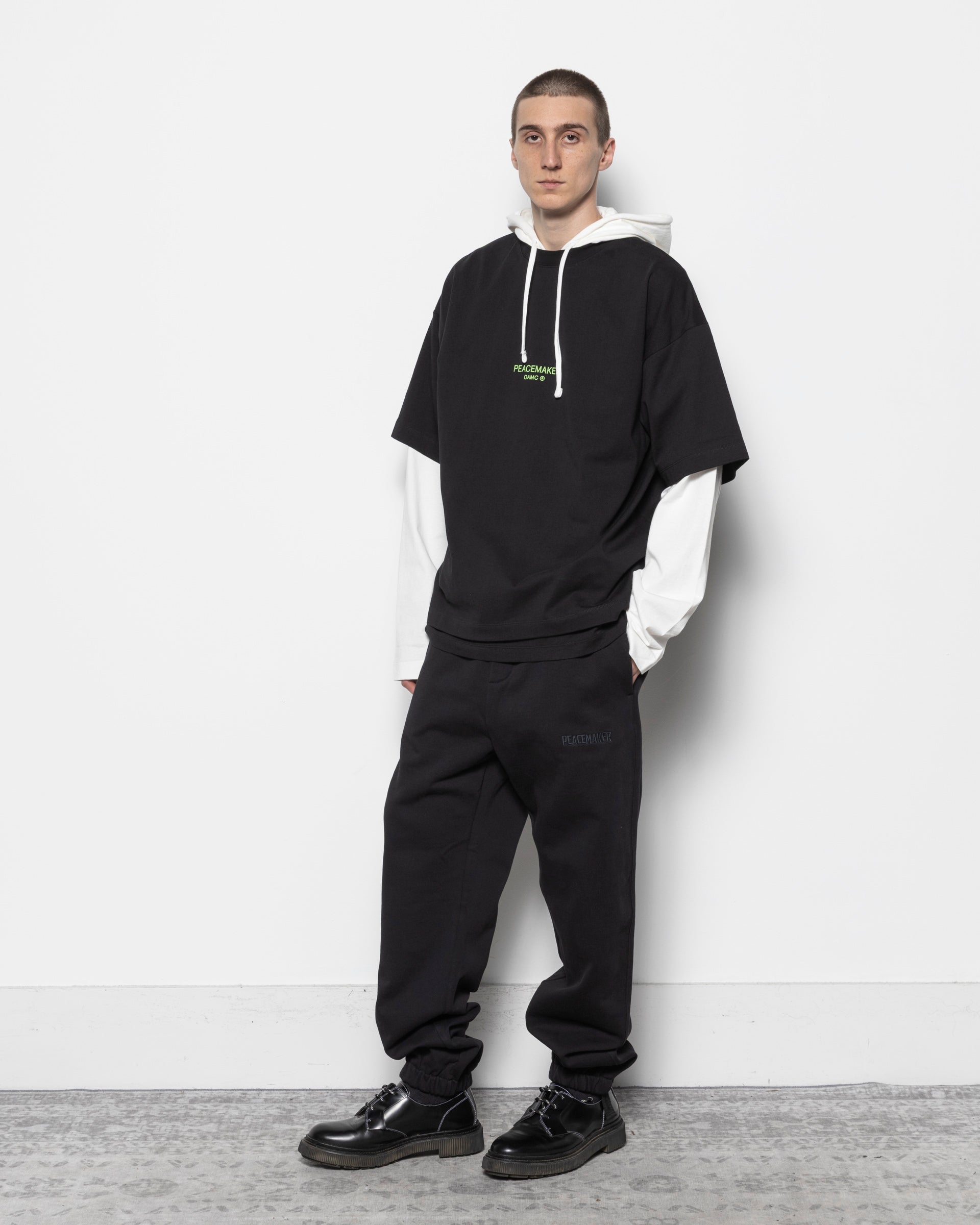 Loose Fit Sweatpants Peacemaker Logo in Black