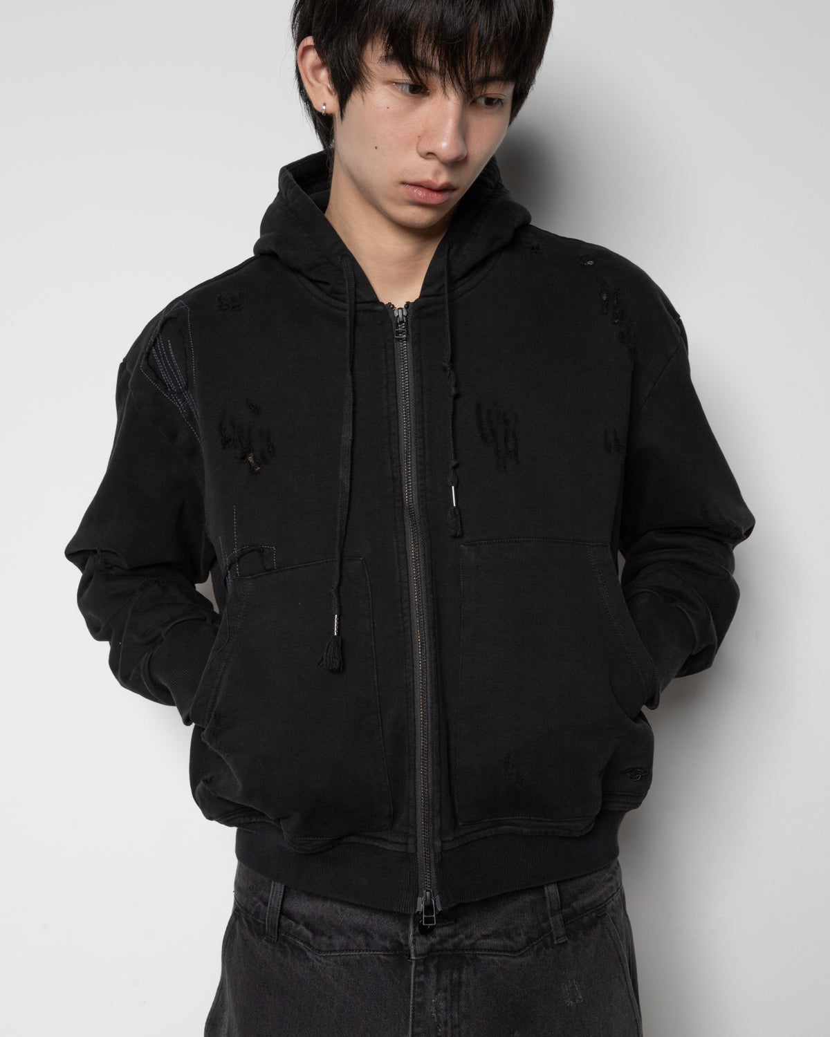 Distressed Zip-up Sweater in Black