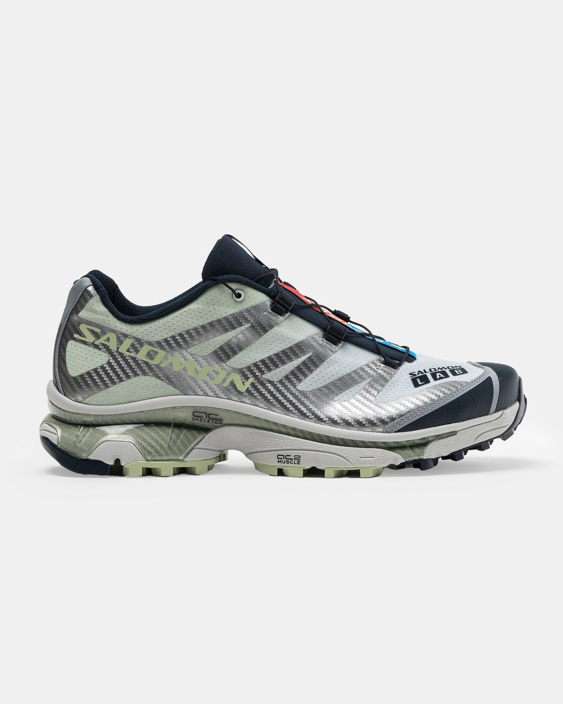 Salomon XT-4 OG in Carbon, Celadon Green, and Silver on the white background.