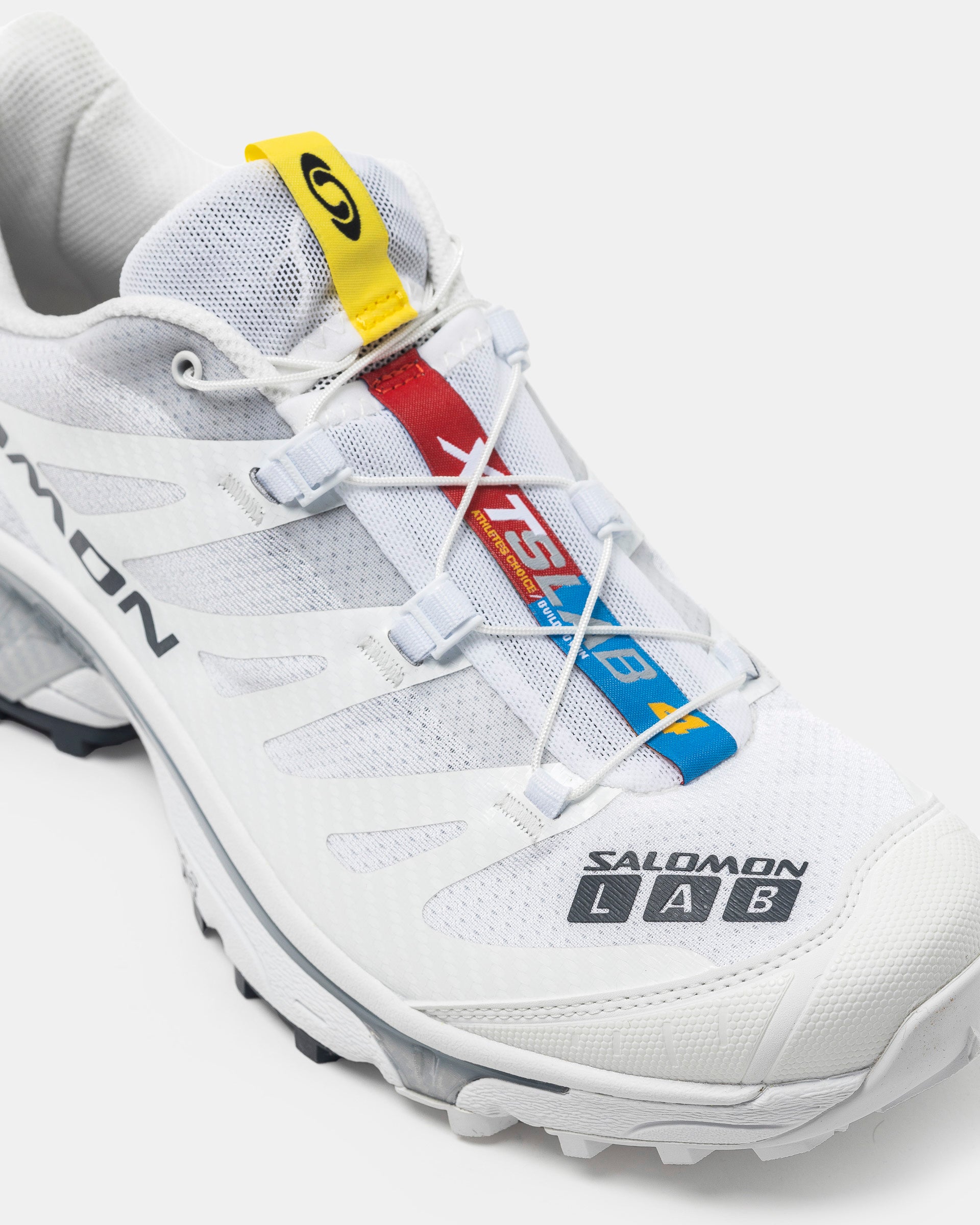 Salomon XT-4 OG in White, Ebony, and Lunar Rock on the white background.