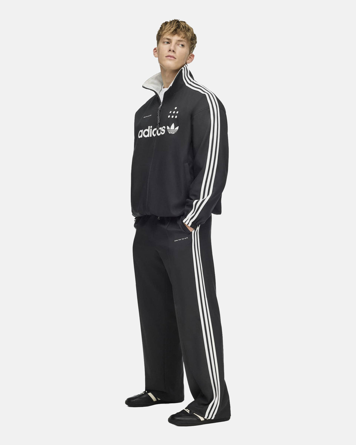 Adi008 Track Jacket in Black