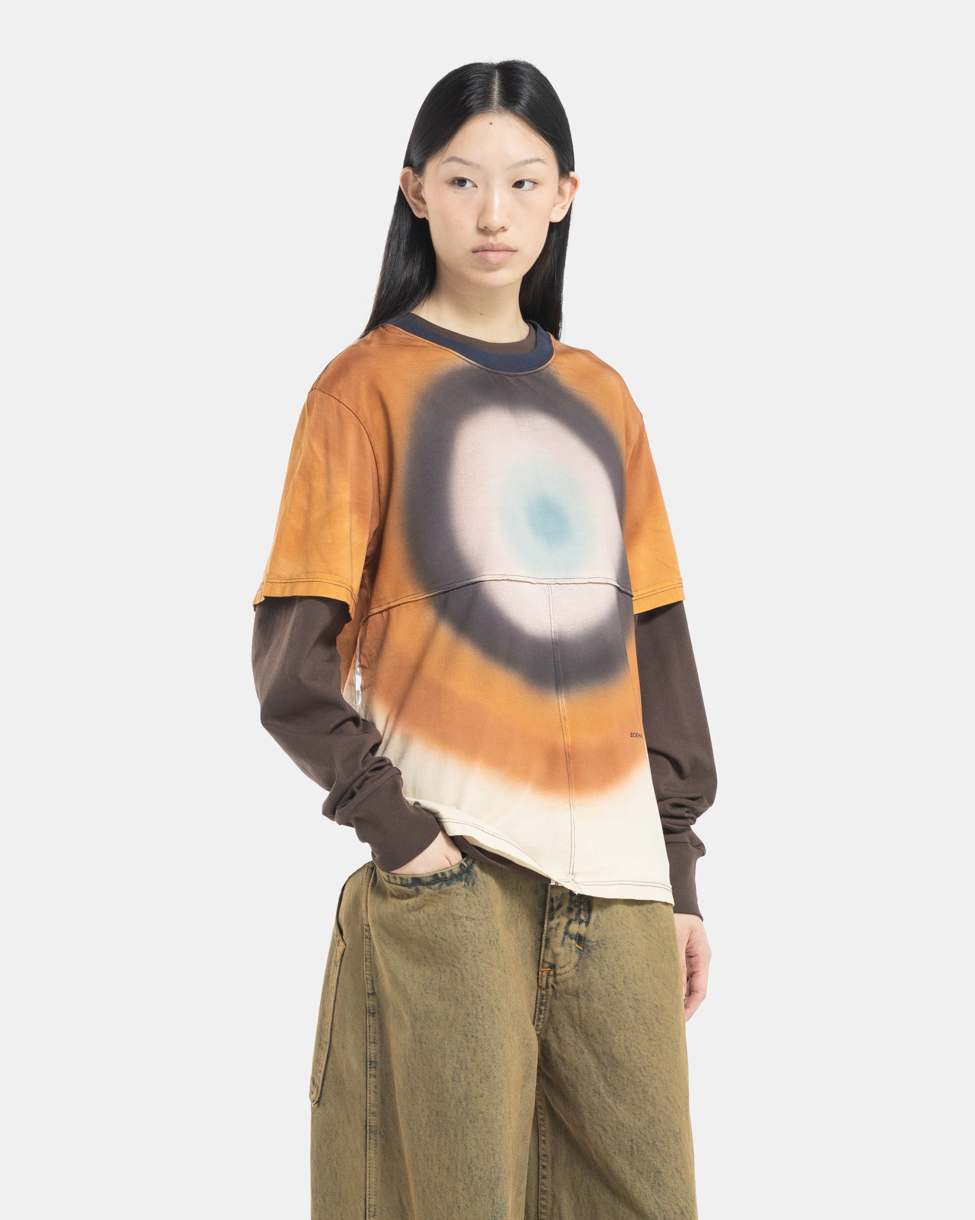 Female Model wearing the Eckhaus Latta Lapped Designer T-Shirt with a printed design