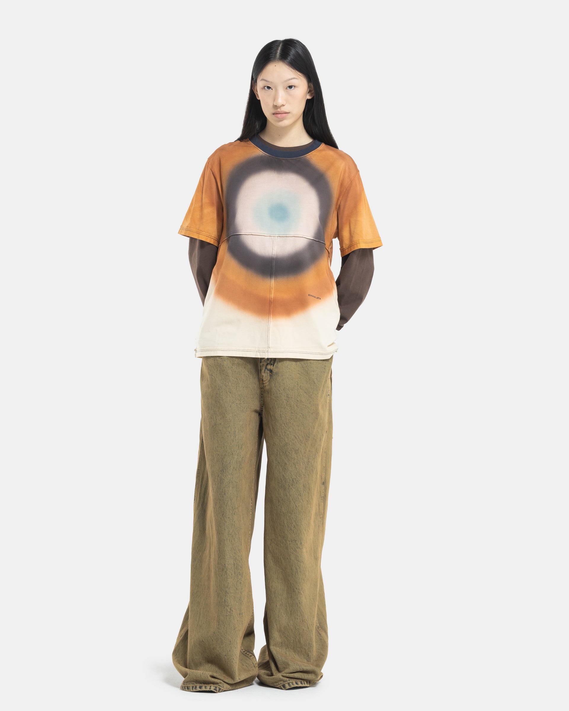 Female Model wearing the Eckhaus Latta Lapped Designer T-Shirt with a printed design
