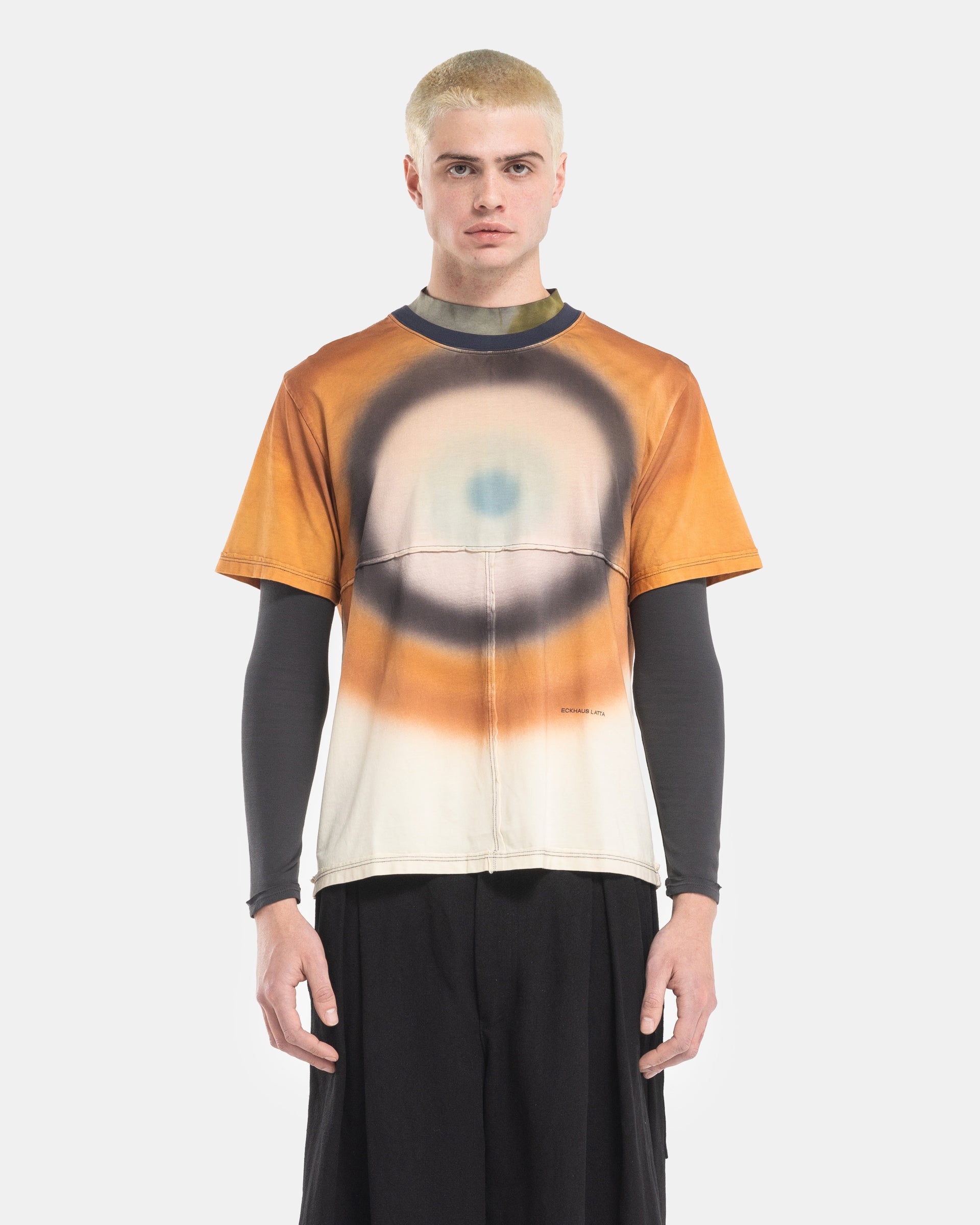 Male Model wearing the Eckhaus Latta Lapped Designer T-Shirt with a printed design