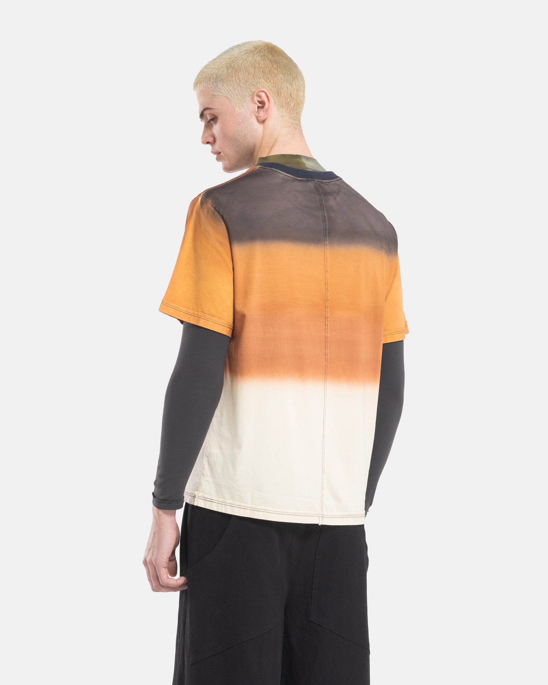 Male Model wearing the Eckhaus Latta Lapped Designer T-Shirt with a printed design