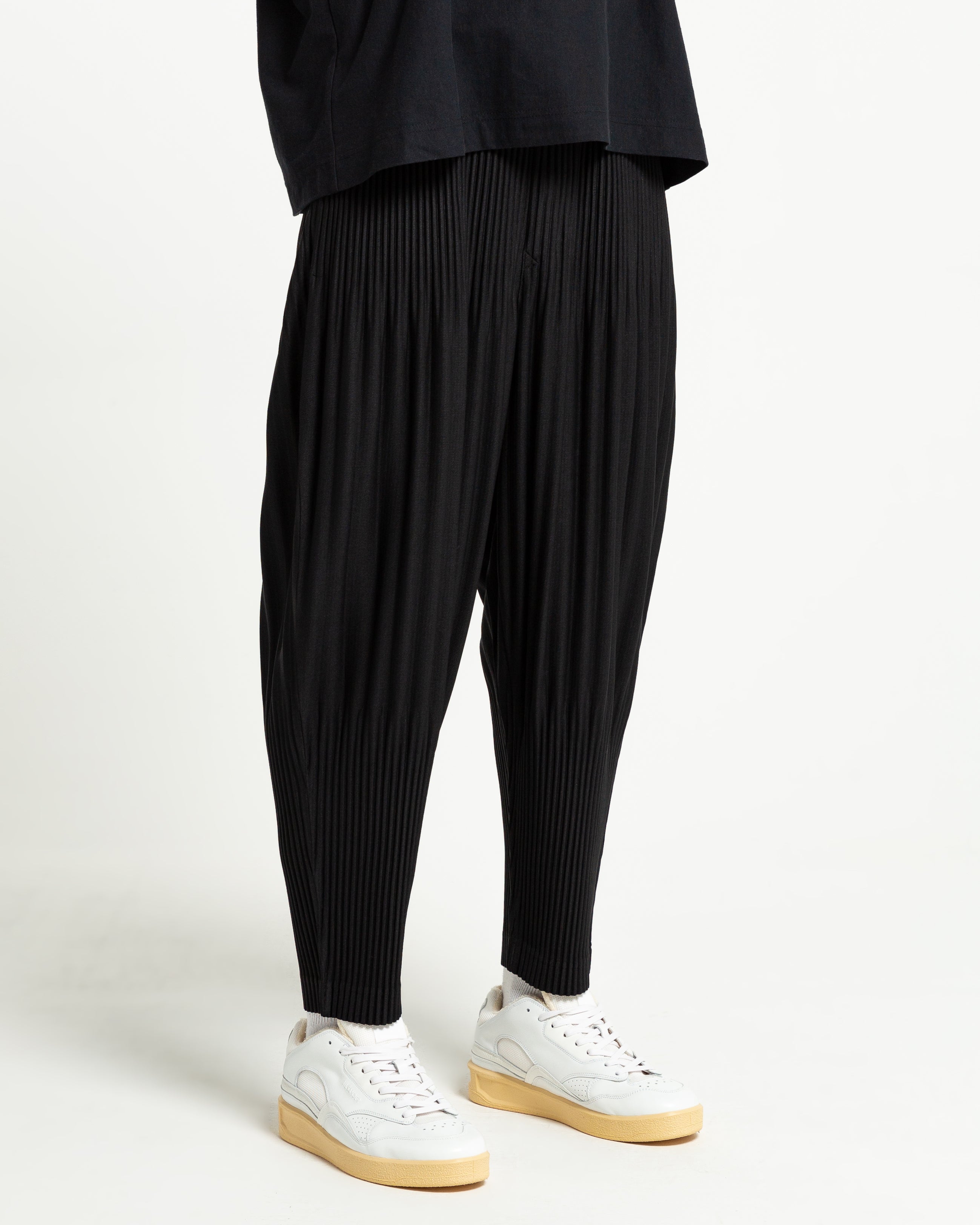Homme Plissé Issey Miyake Tapered Pleated Pants in Black